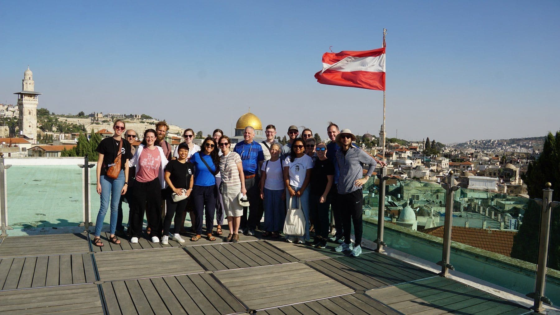JUC students pose on a rooftop overlooking Jerusalem’s Old City.
