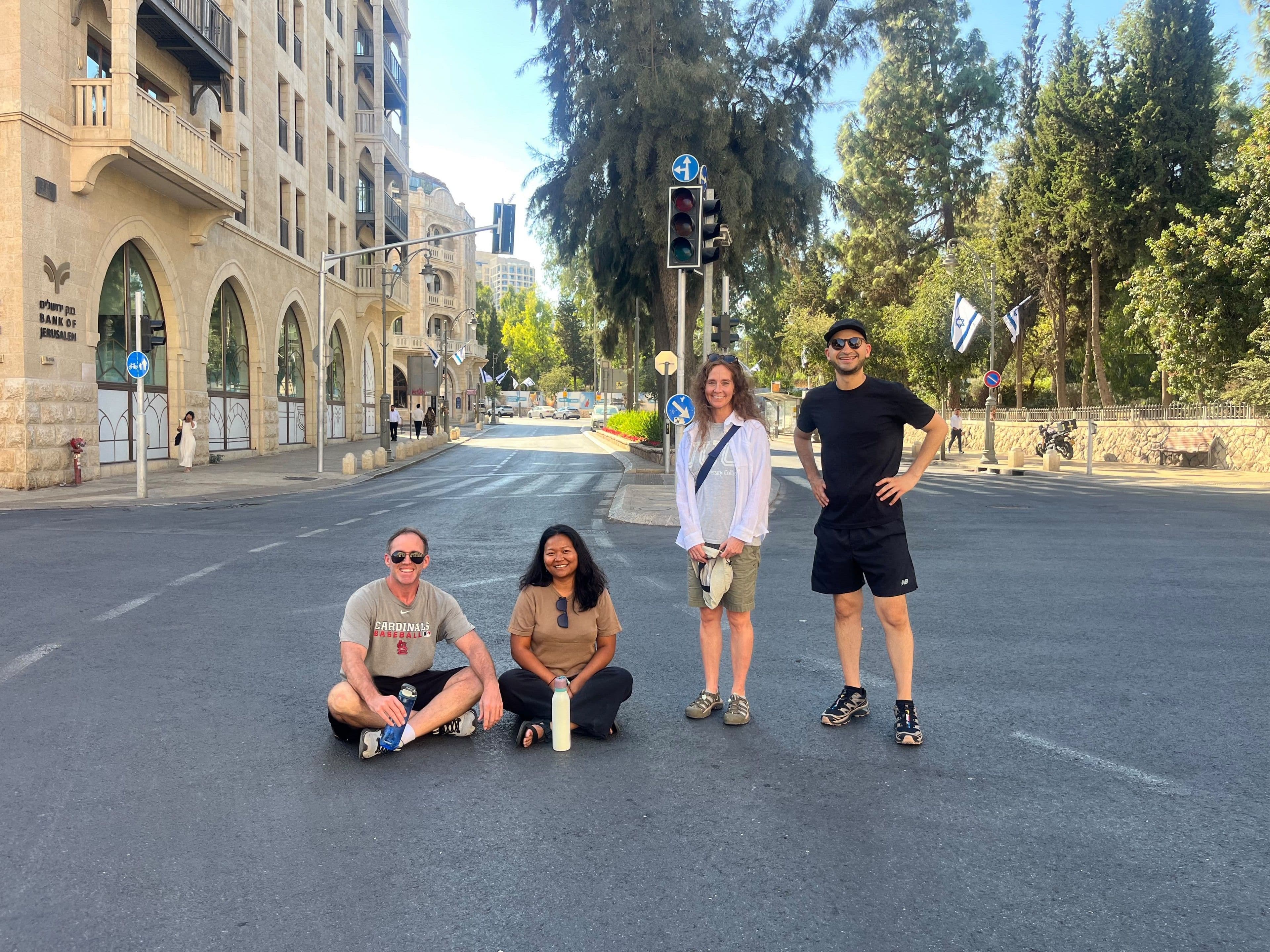 JUC community members gather on a quiet Jerusalem street.