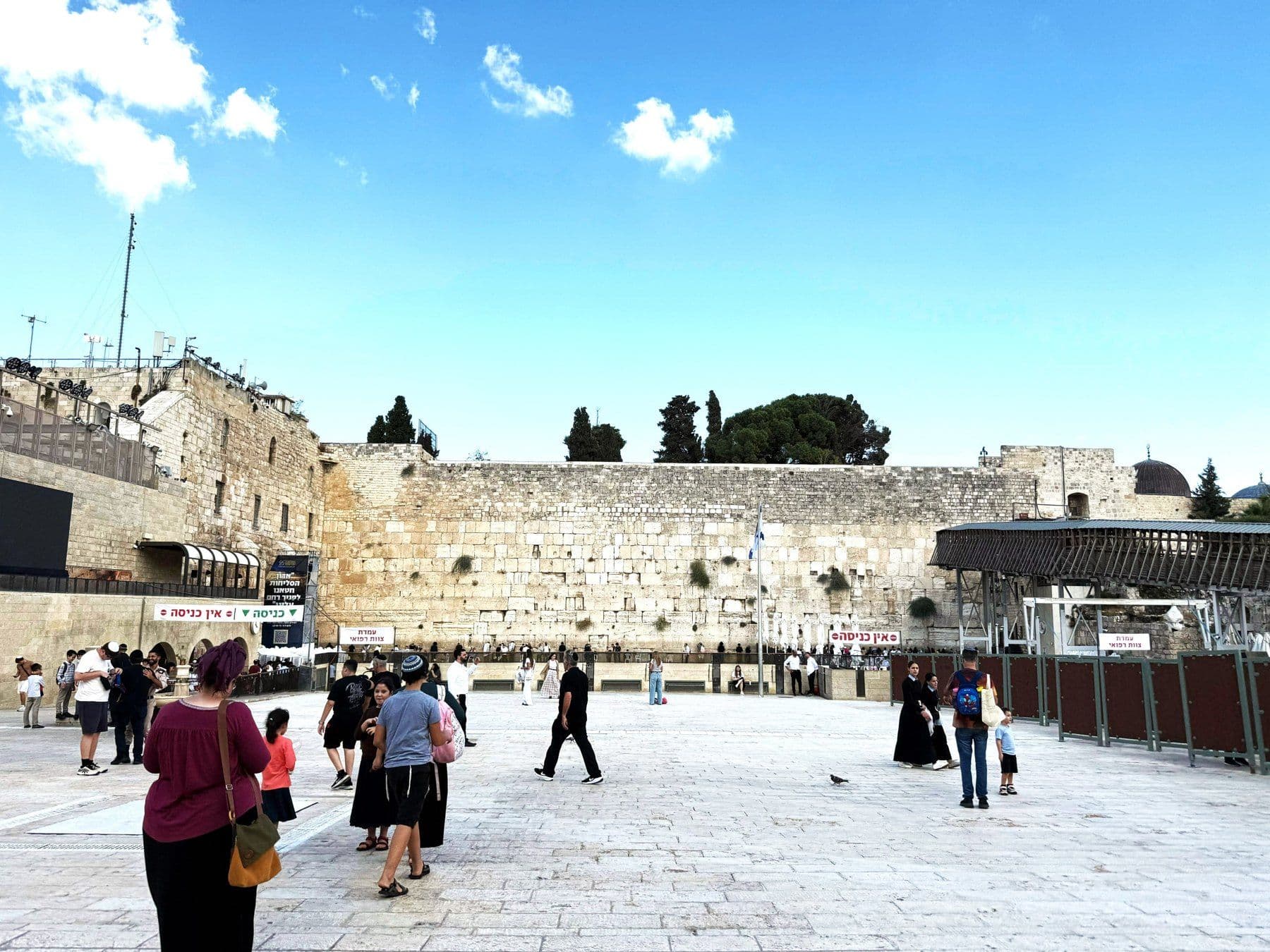 Visitors walk across the Western Wall plaza in Jerusalem.